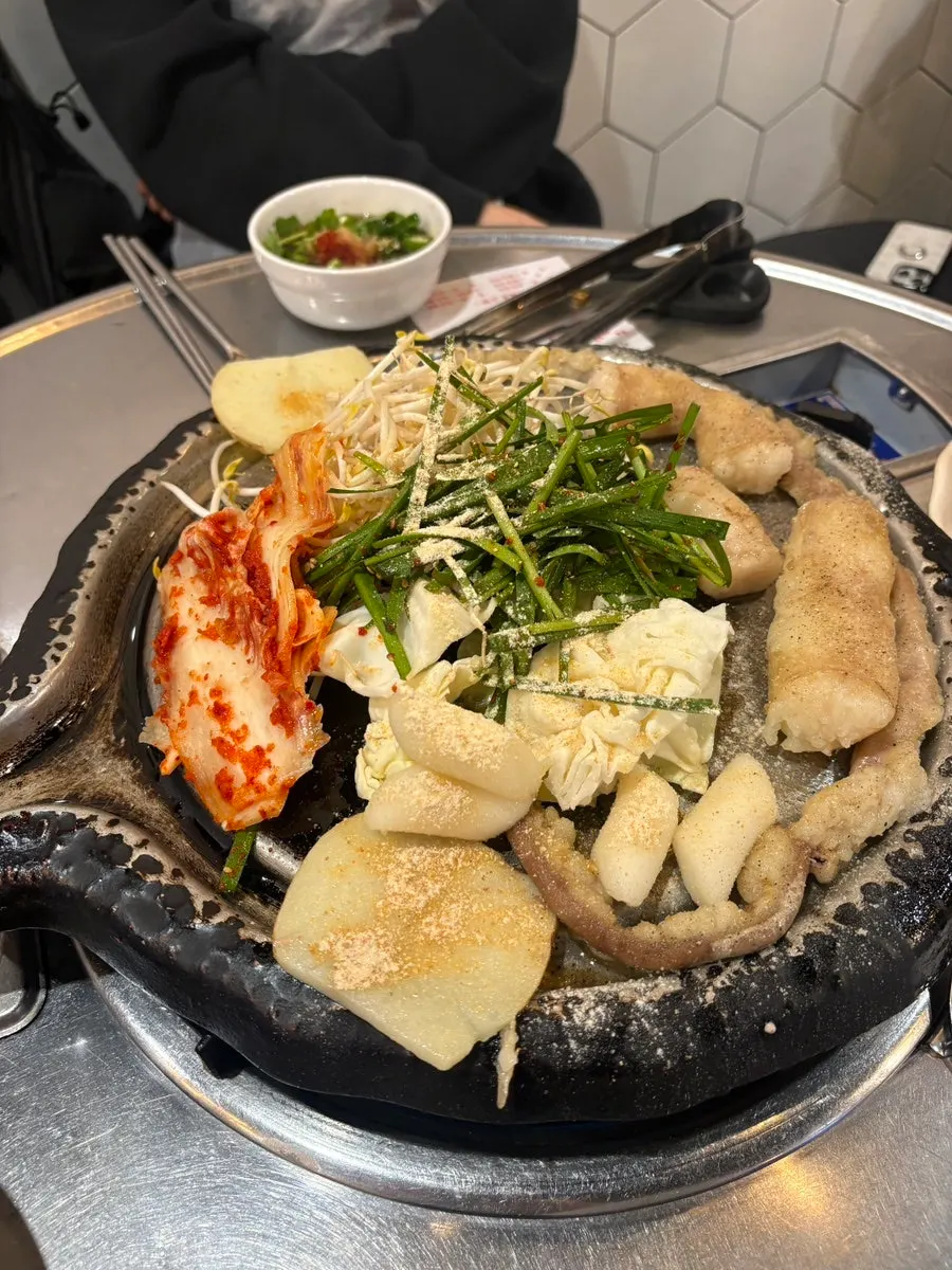 Potatoes and rice cakes frying in beef fat
