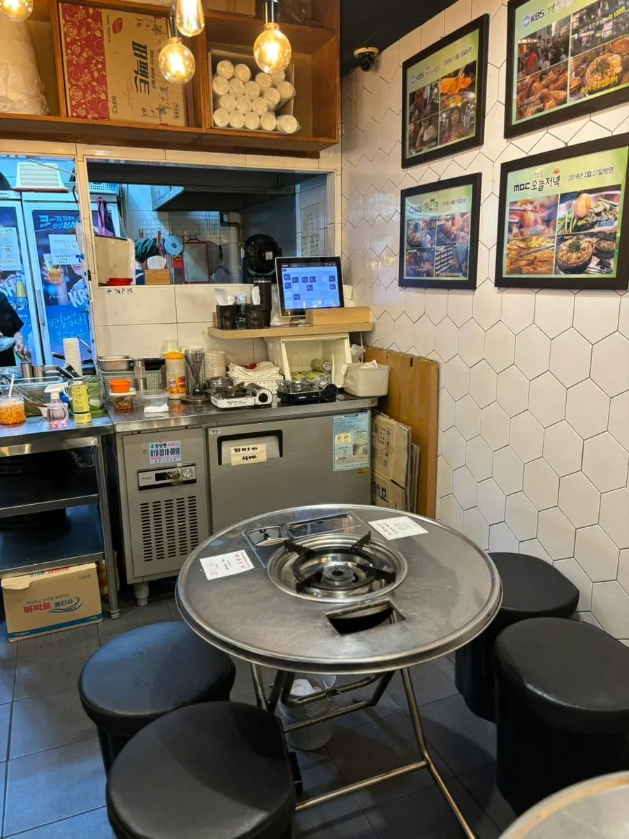 Interior of the restaurant with an old-school outdoor tent atmosphere