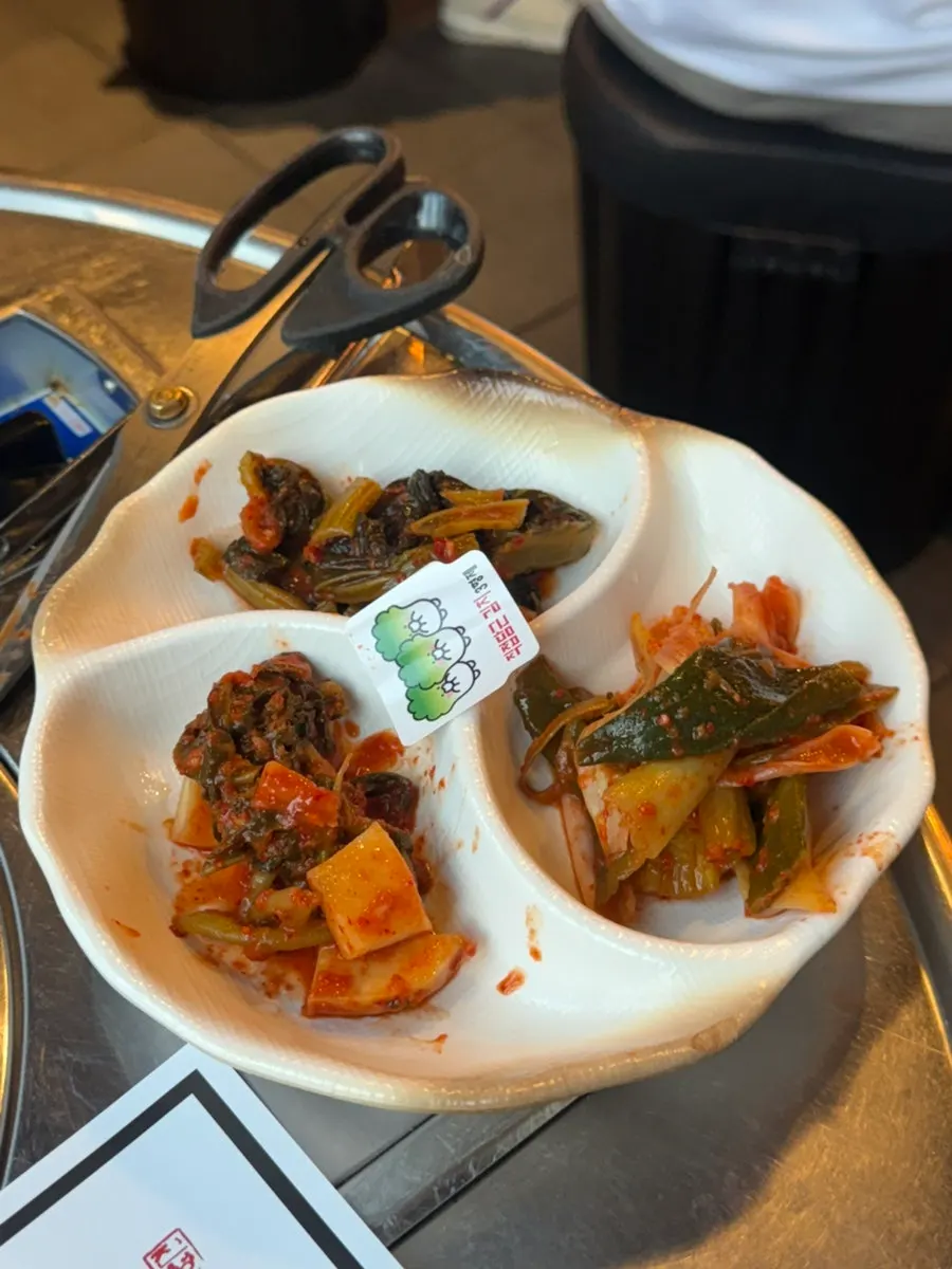 House-made scallion kimchi and mustard leaf kimchi