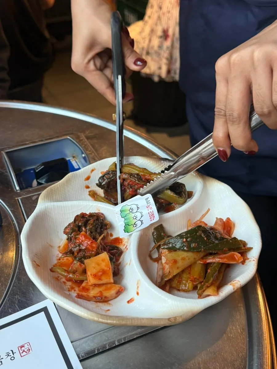 A plate of three kinds of house-made kimchi
