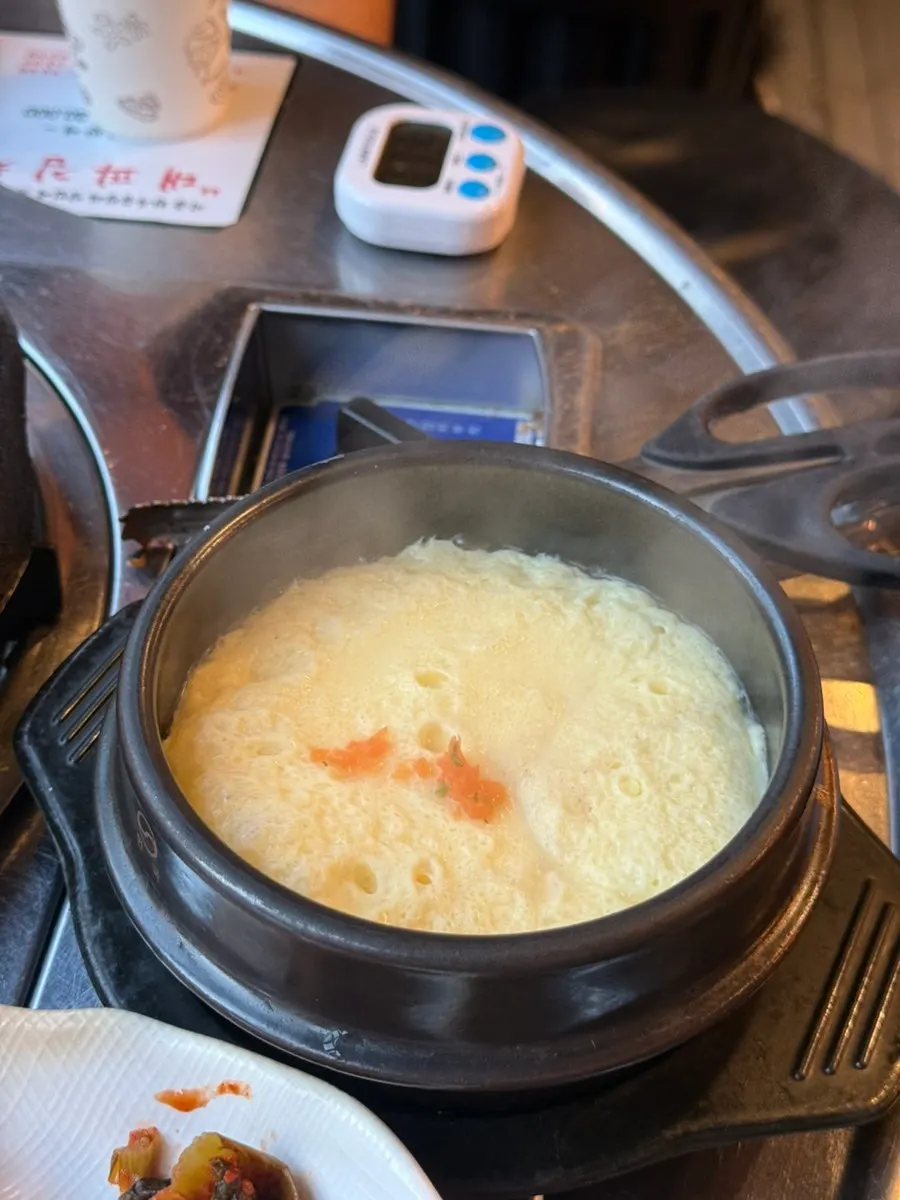 Complimentary steamed egg served with the meal