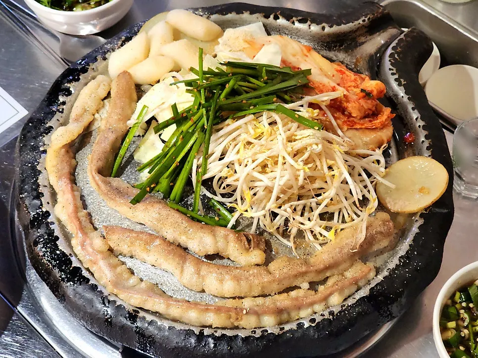 Two servings of pre-cooked hanwoo gopchang on a tray