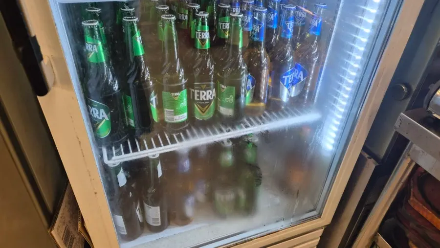 Fridge stocked with Terra Light and Terra 0.00 beer