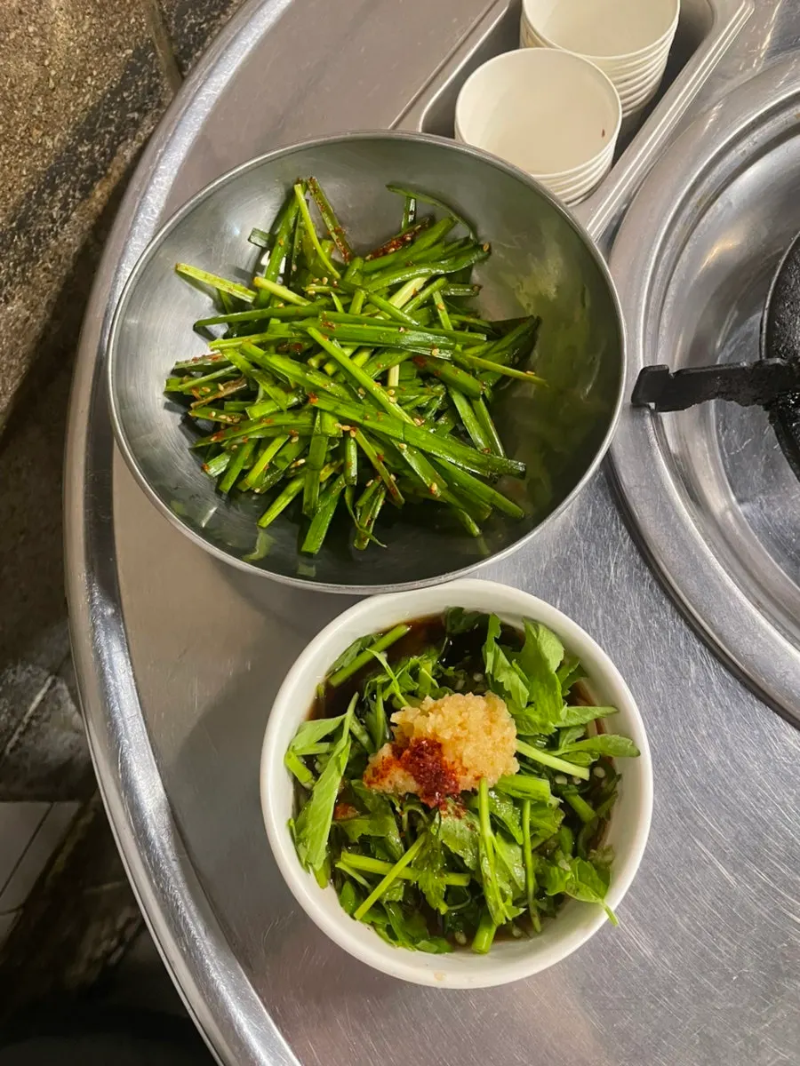 Complimentary steamed egg and side dish spread