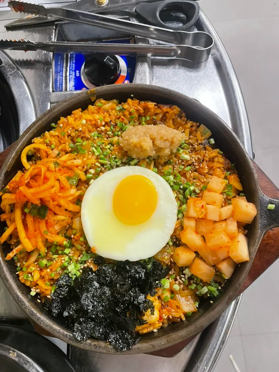 A bowl of tangy-spicy kkakdugi fried rice