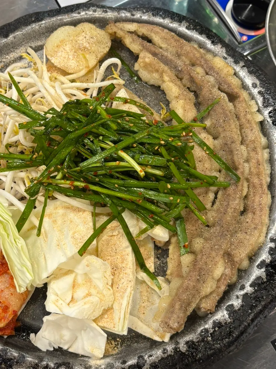 Long strips of hanwoo beef gopchang before grilling