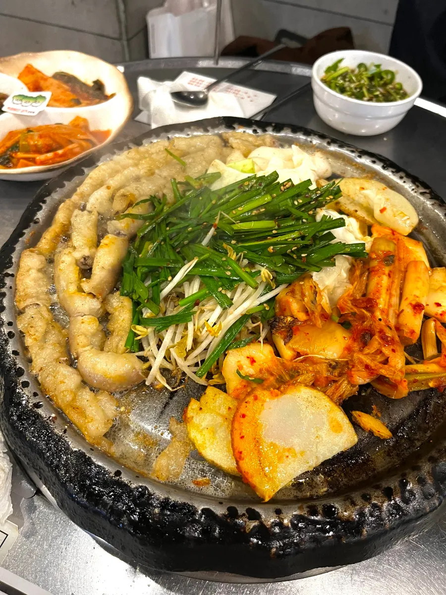 Tangy fermented scallion kimchi and mustard leaf kimchi side dishes