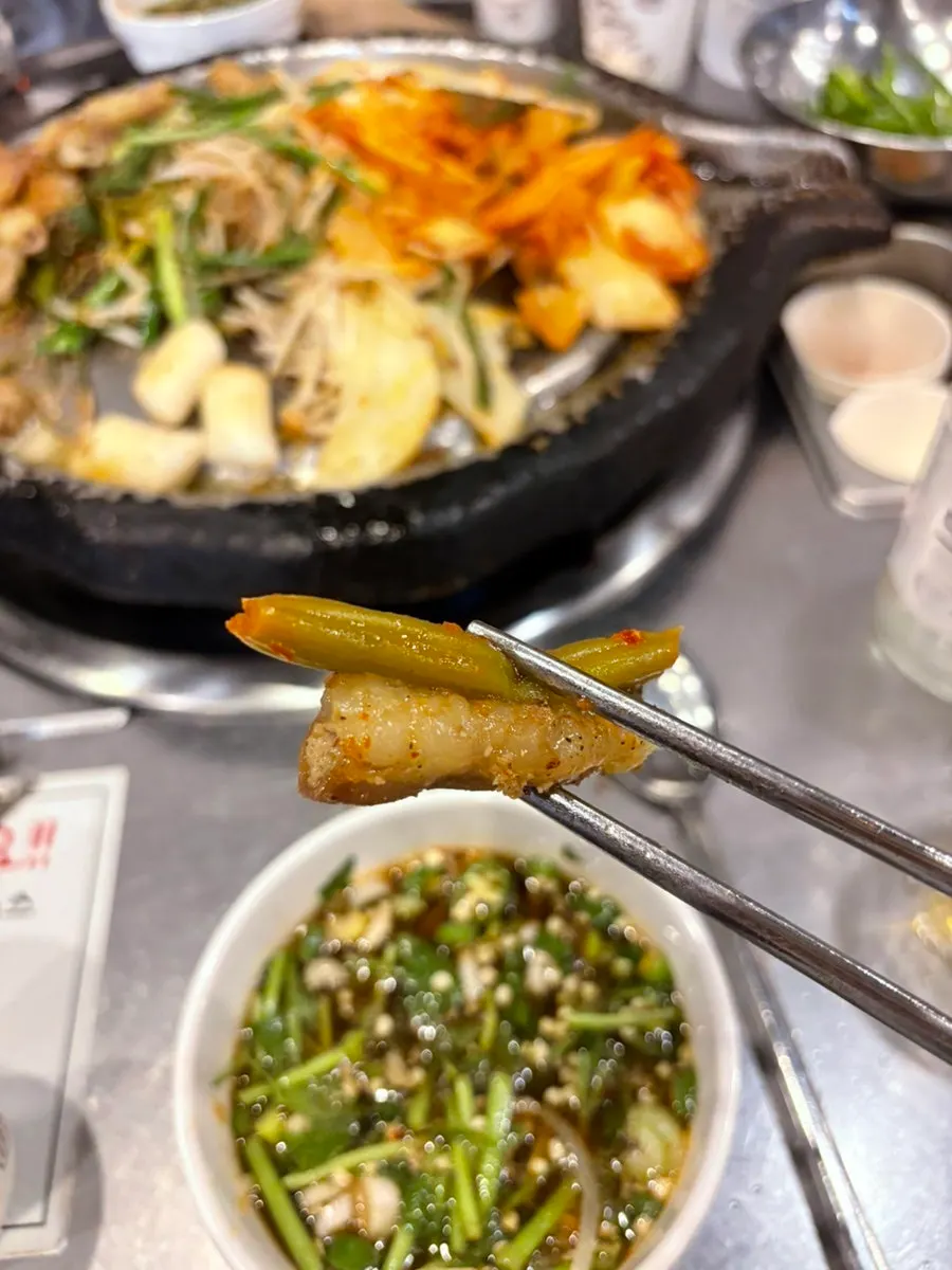 Close-up of a beef gopchang cross-section packed full of gop