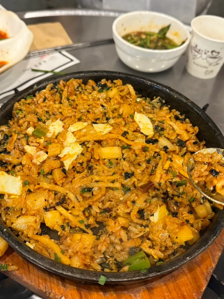A spoonful of the kkakdugi onion fried rice