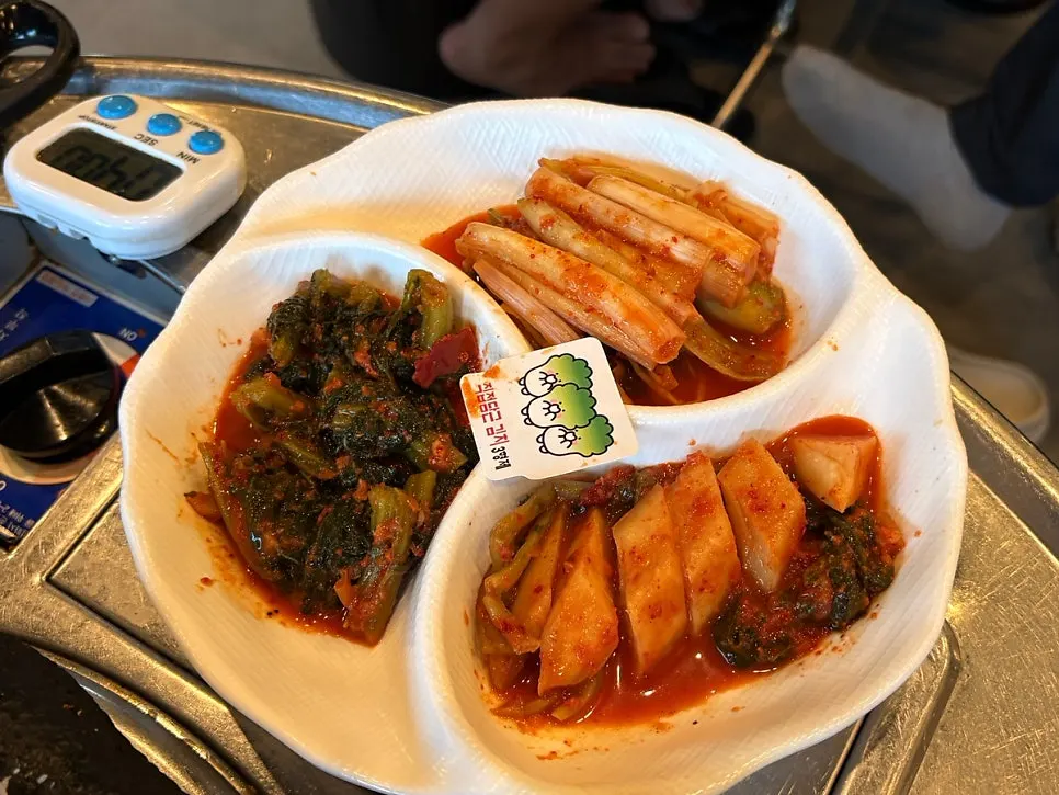 House-made gat, yeolmu, and daepa kimchi, 3 kinds