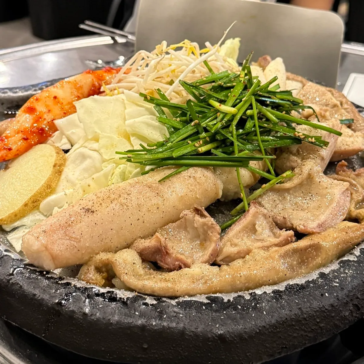 Grill topped with one each of hanwoo gopchang, makchang, and daechang