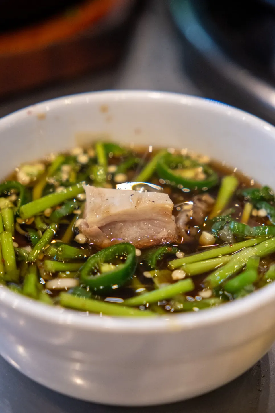 A golden, perfectly grilled piece of gopchang