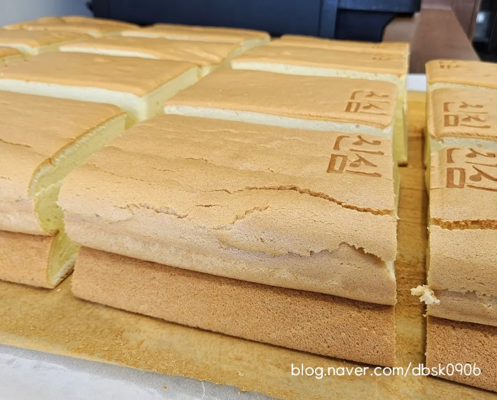 Original and chocolate castella boxes side by side