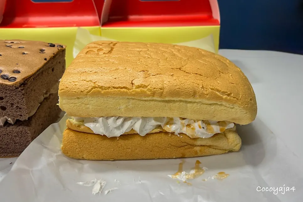 Castella cut into pieces on a plate