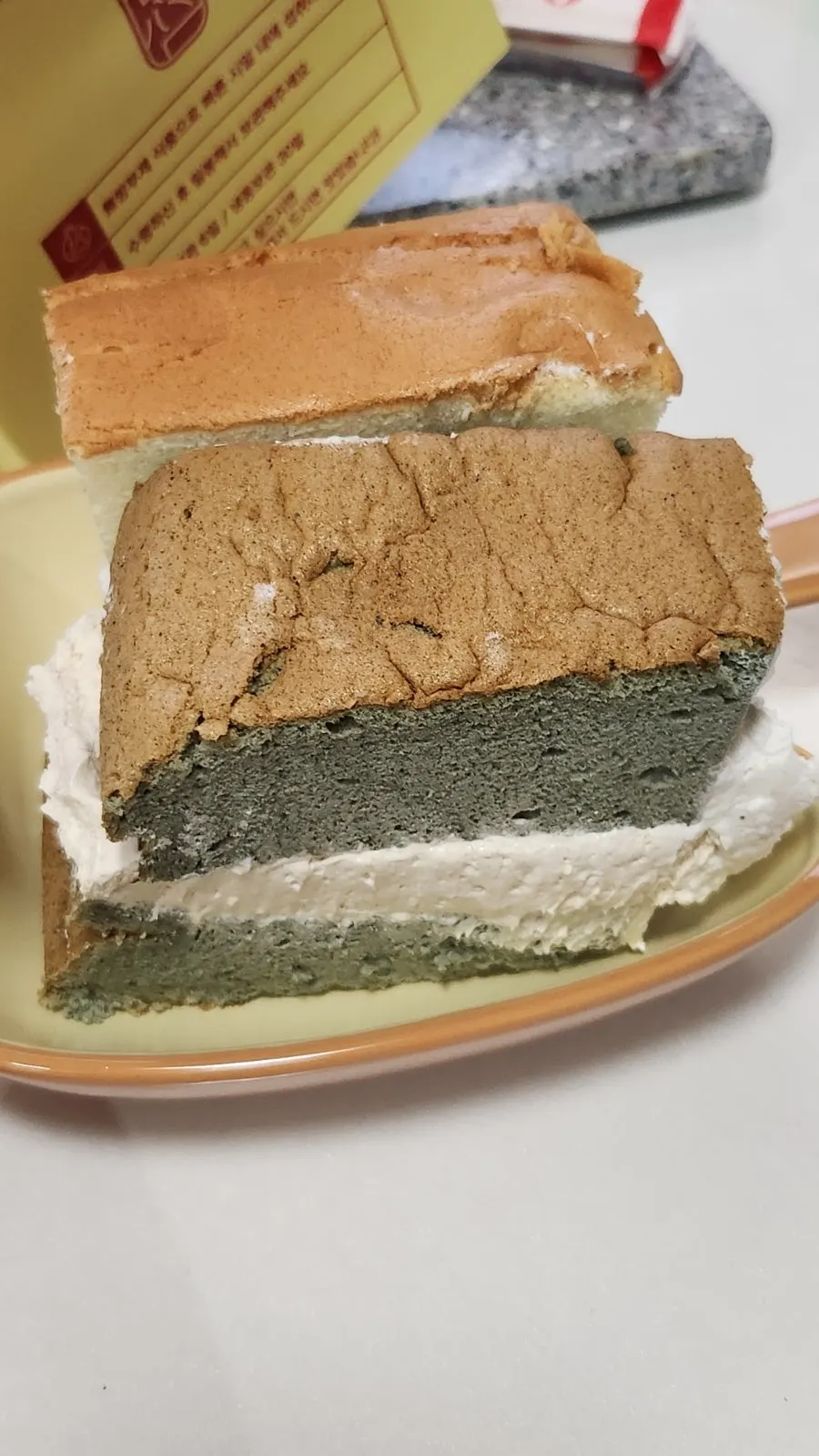 Sliced piece of castella plated on a dish