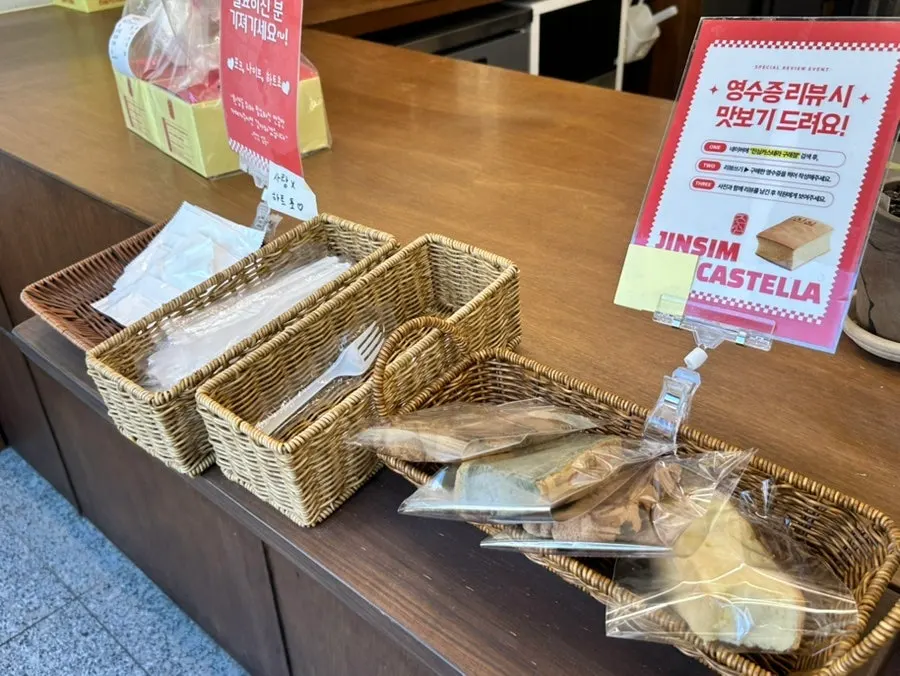 Forks, knives, and wet wipes set up at the entrance