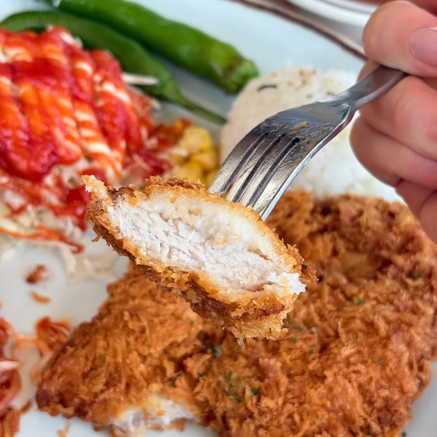 Cross-section of a thickly cut pork cutlet