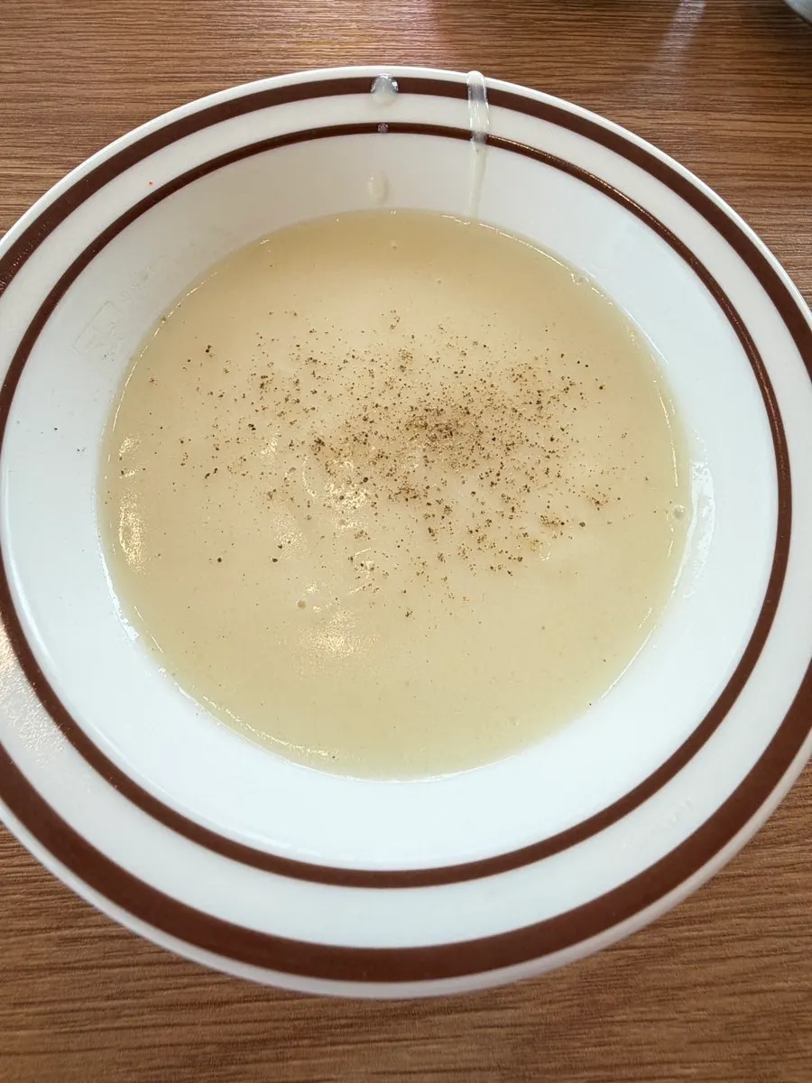 Cream soup and side dishes brought from the self-serve bar