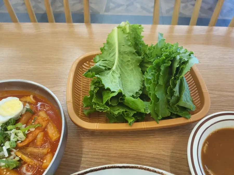 Set of wang donkatsu, jjolmyeon, and cream soup on the table