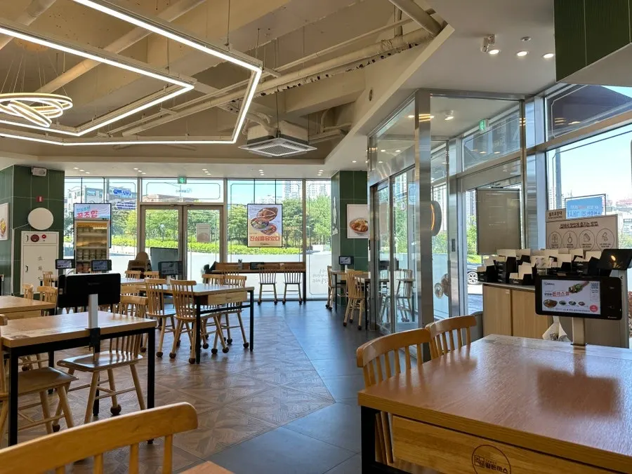 Spacious dining hall seating at Jinsim Wang Donkatsu Buldang