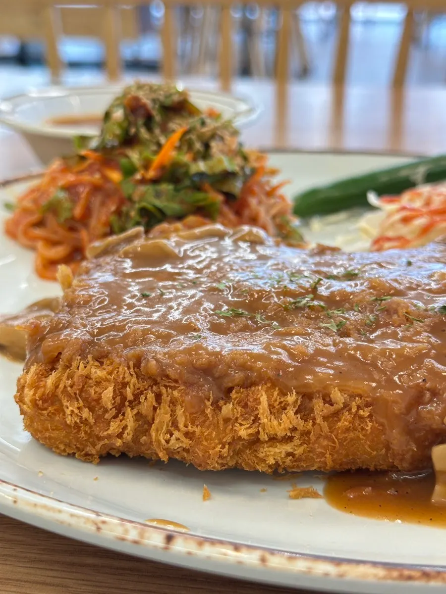 Thick cheese cutlet before being cut open