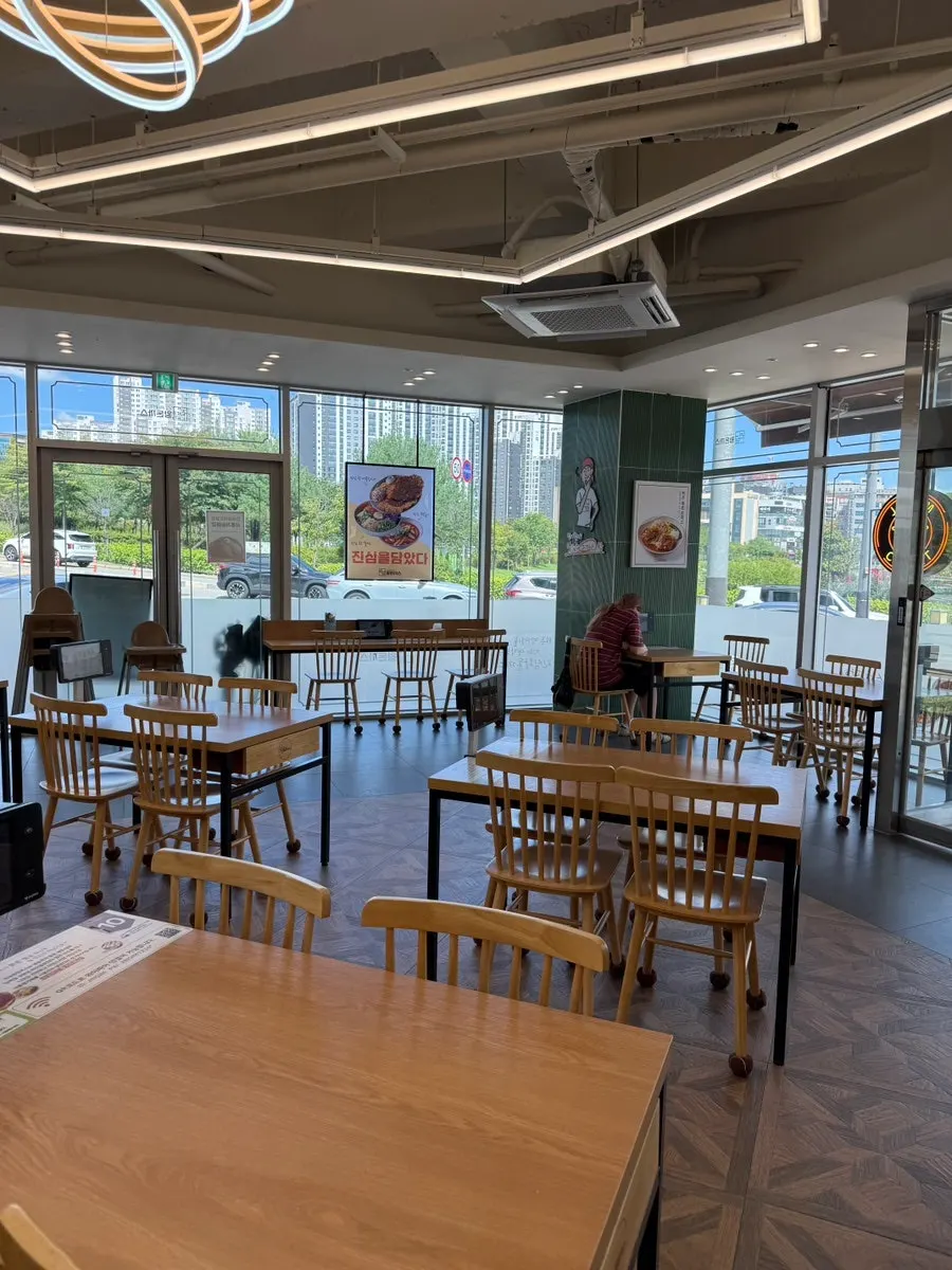 Dining hall with customers before lunch hour