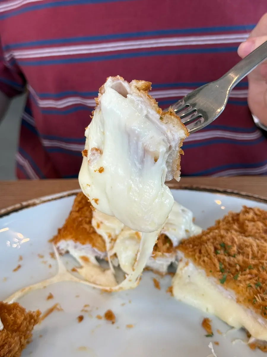 Cheese pouring out like a waterfall