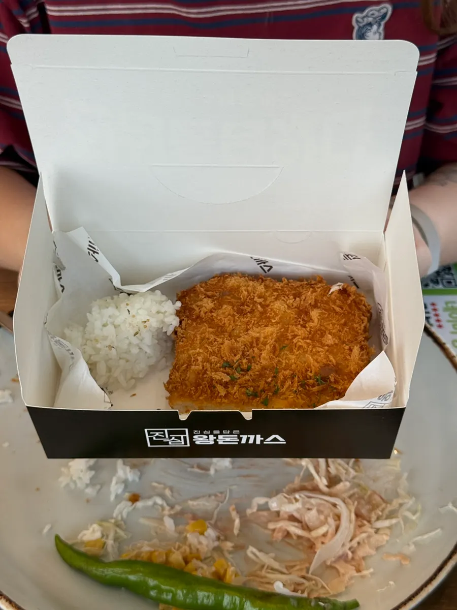 A stretchy bite of the cheese pork cutlet