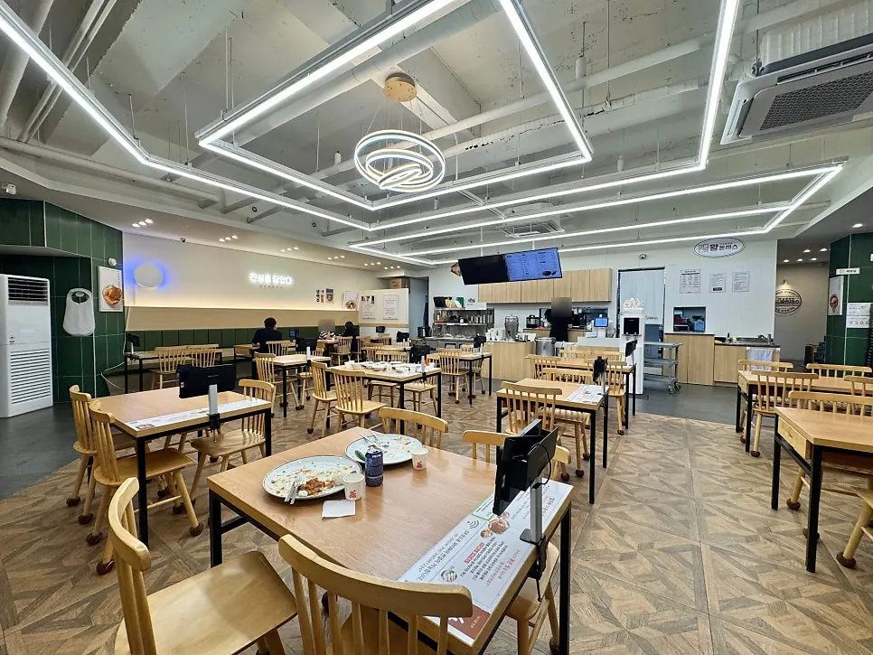 Spacious hall seating at Jinsim Wang Donkatsu Cheonan Buldang