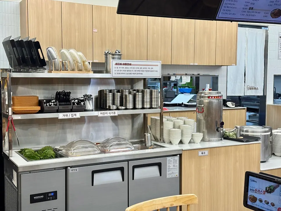 Self-serve bar corner with soup and side dishes