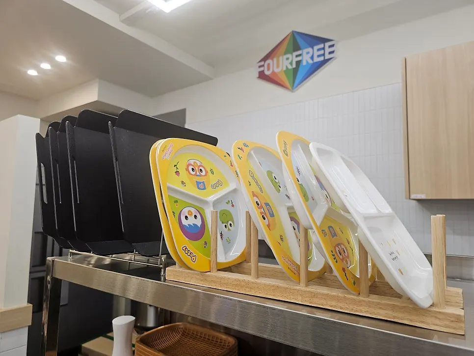 Kids' trays and dishware at the self-serve bar