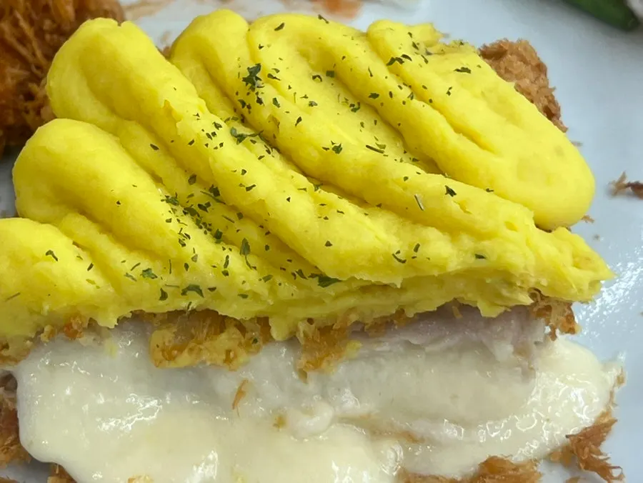 Cross-section of the sweet potato cheese cutlet showing sweet potato and cheese