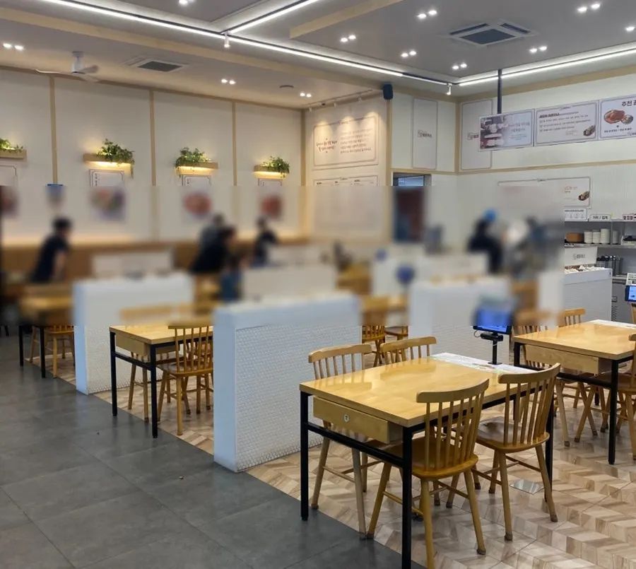 Clean interior with generously spaced tables