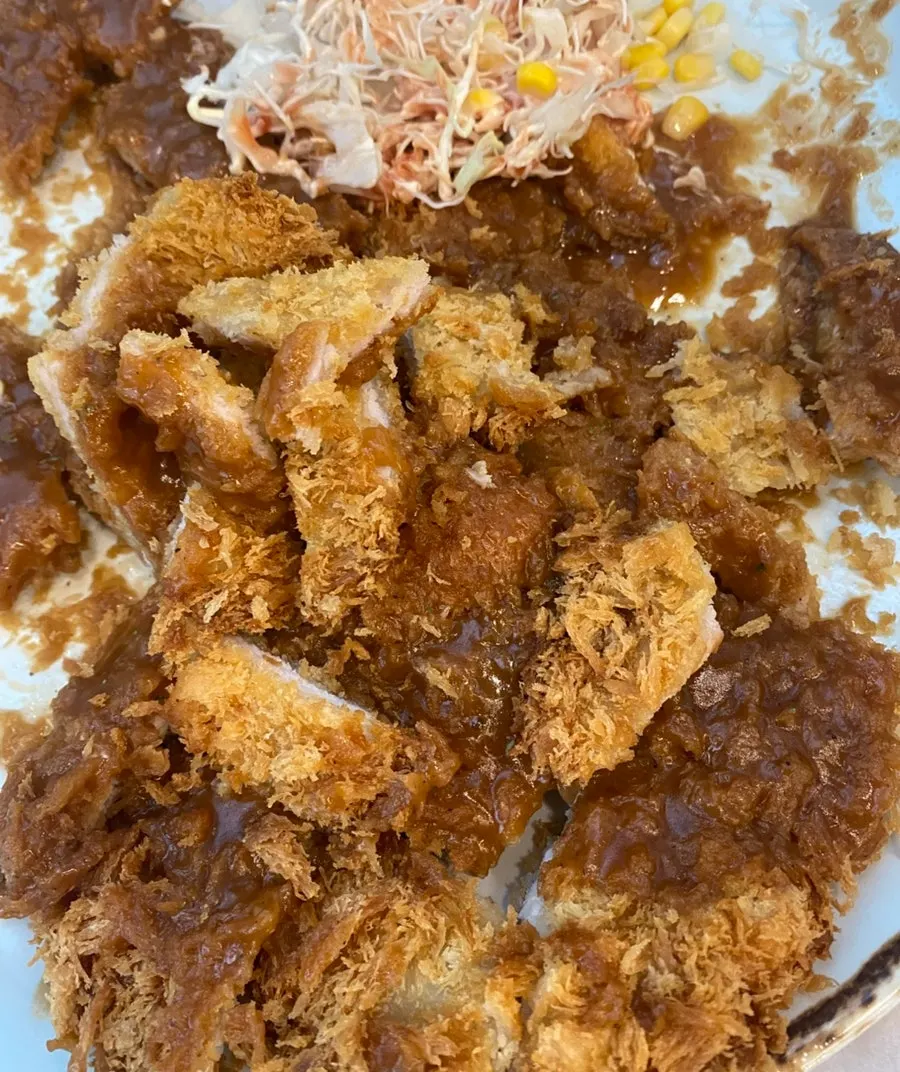 Wang donkkaseu generously topped with sauce