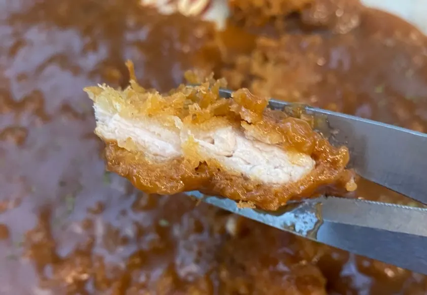Sliced cutlet showing the thick meat inside