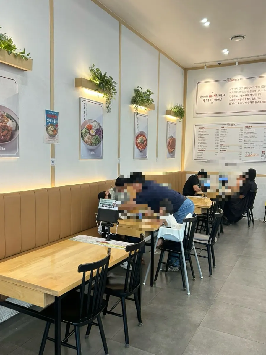 Spacious, clean interior of Jinsim Wang Donkkaseu Cheomdan