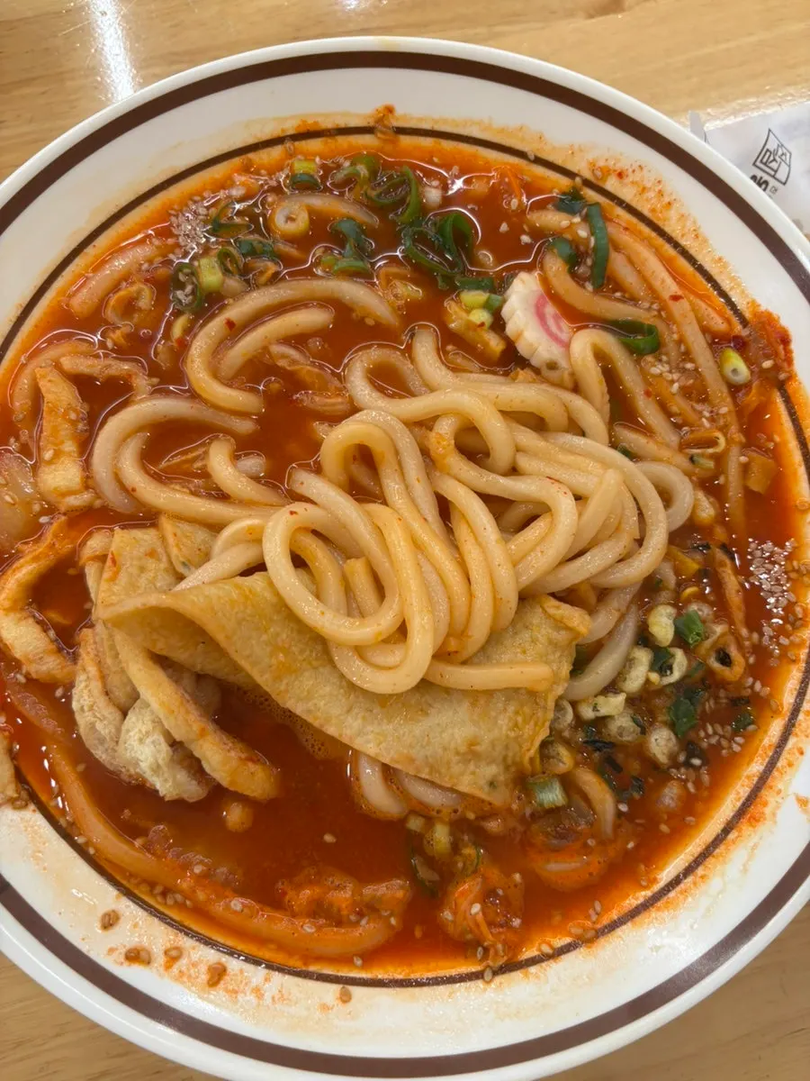 Spicy kimchi udon broth with noodles