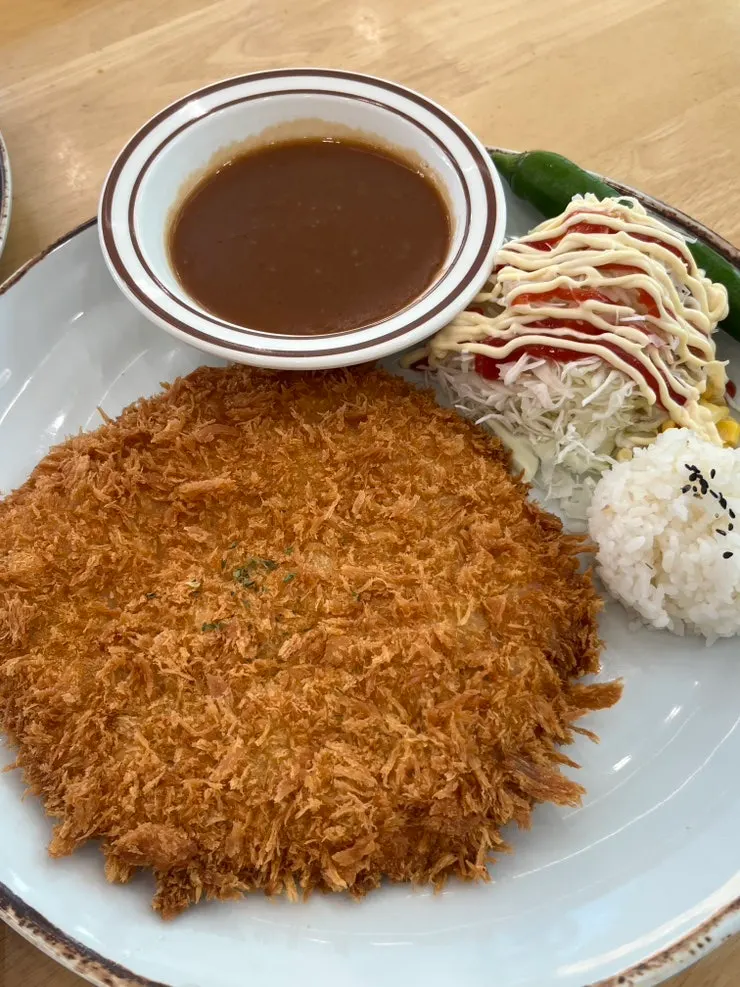 Kimchi nabe served alongside the cutlet