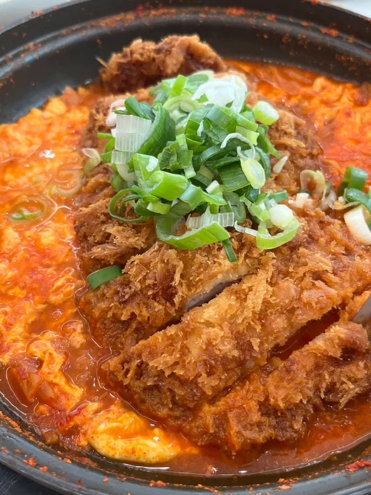 Wang donkkaseu plate with sauce served on the side