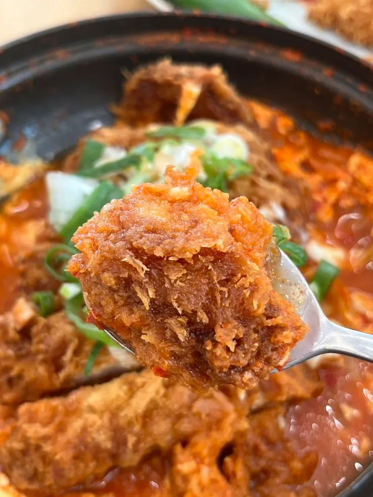 Close-up of the crispy breaded coating on the cutlet
