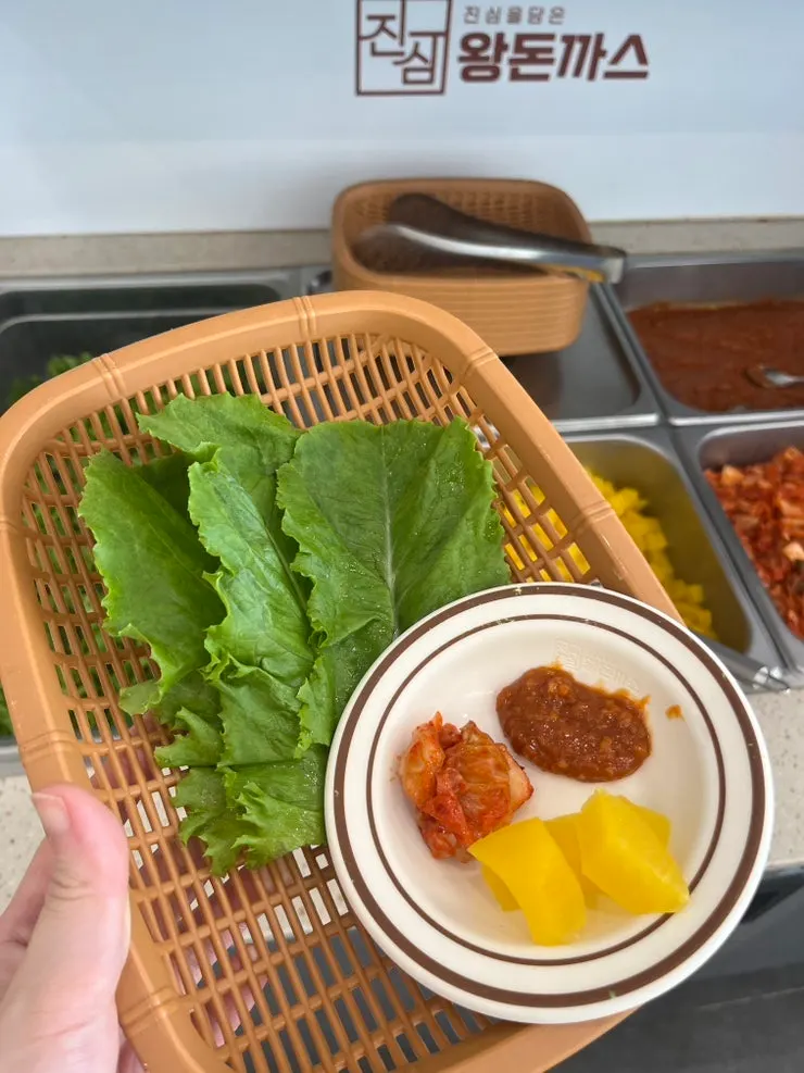 Donkkaseu wrapped in lettuce leaf
