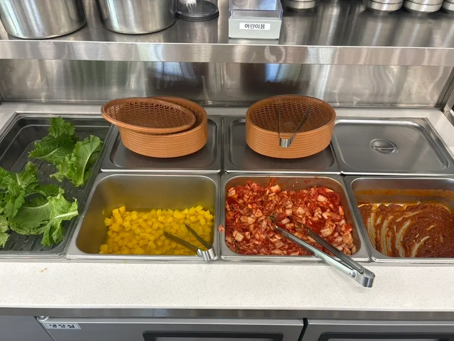Various side dishes prepared at the self-serve bar