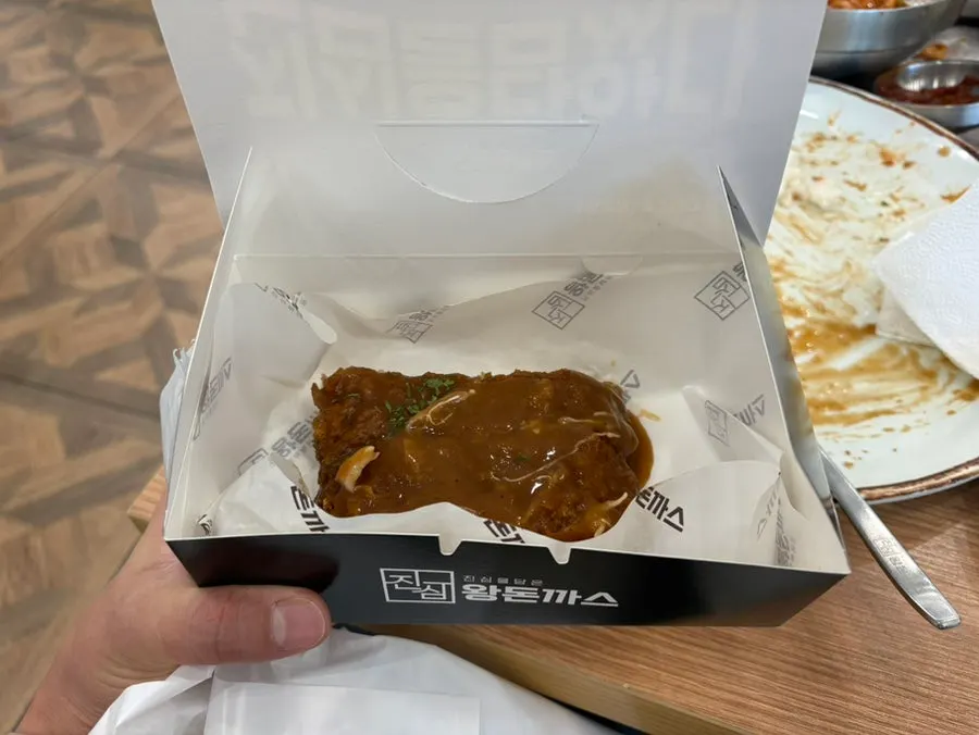 Leftover cutlet packed in a to-go container