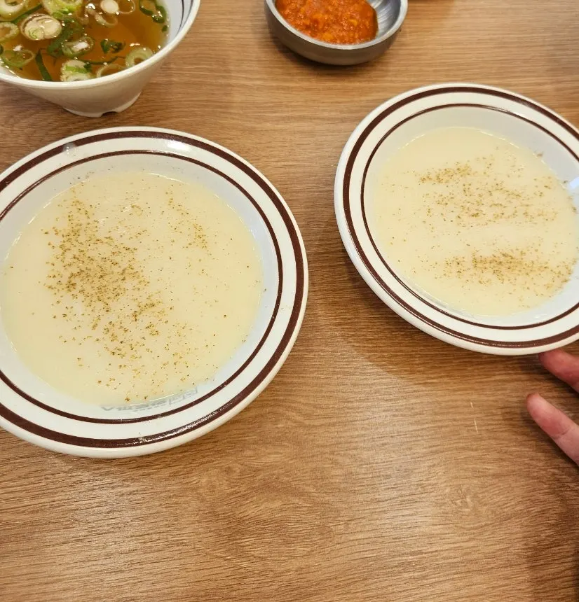 Self-serve bar with soup and udon broth