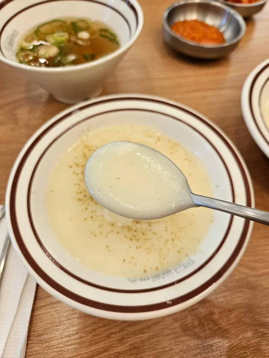 Ssamjang and side dish containers at the self-serve bar