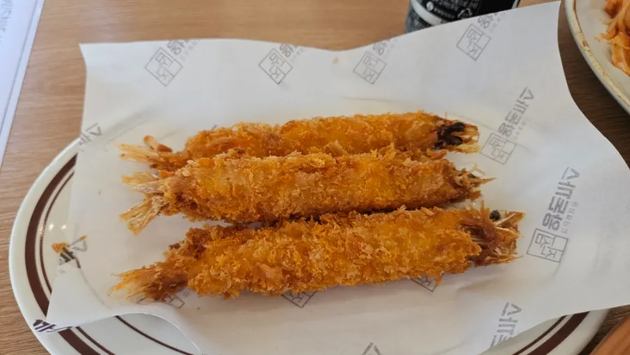 A plate of three plump jumbo fried shrimp