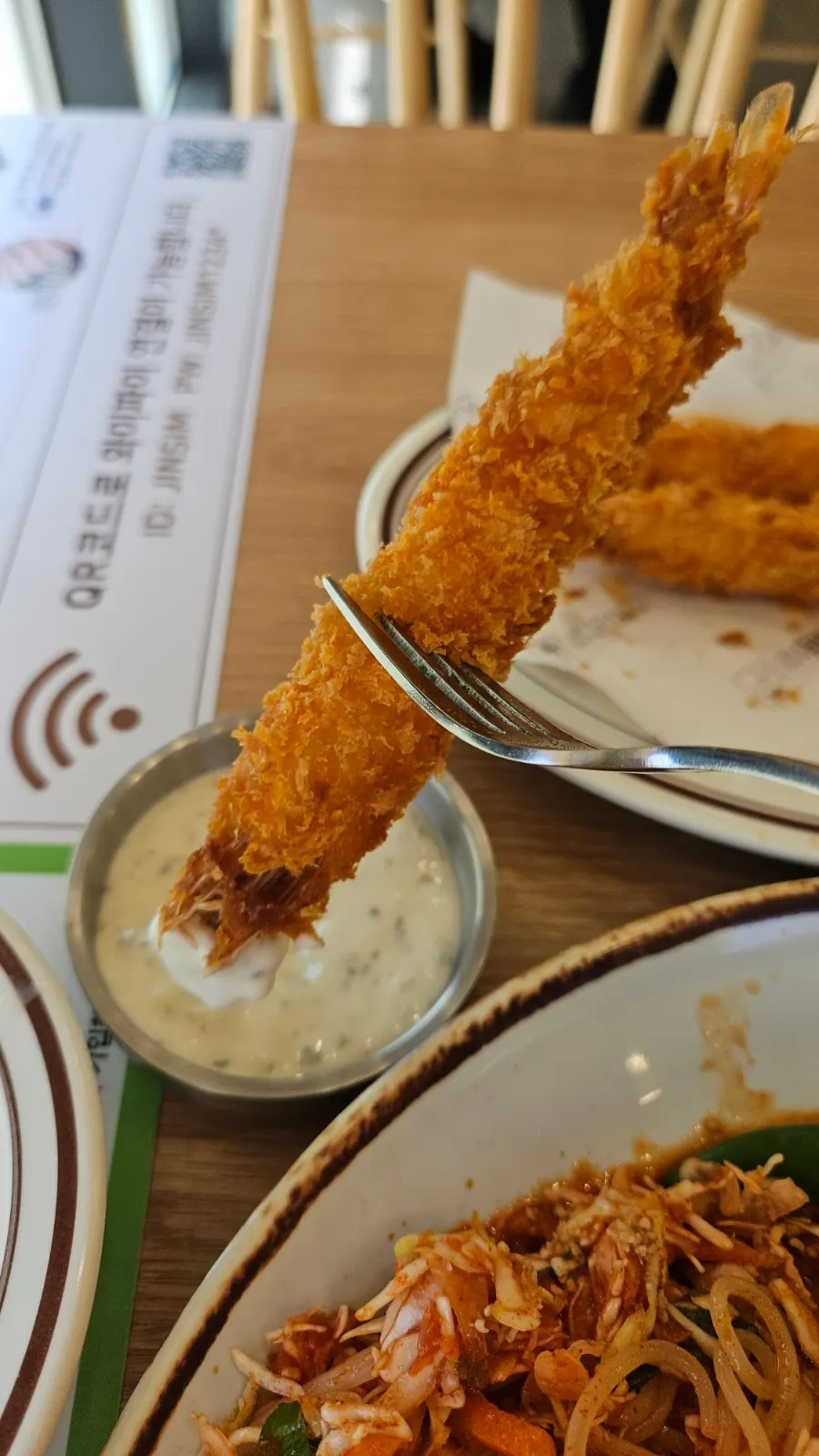 Cross-section of the cheese cutlet with cheese pouring out when cut