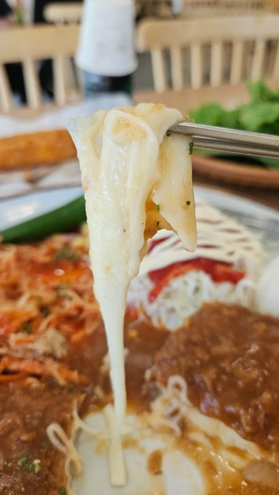A meal spread with cutlet, jjolmyeon, and fried shrimp together