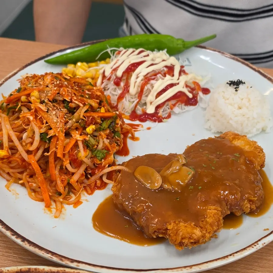 Pork cutlet table setting delivered by robot server
