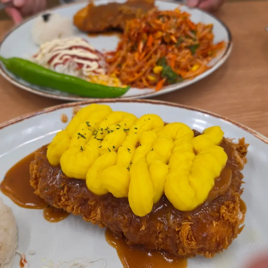 Cabbage salad served alongside the pork cutlet